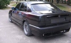 4 999 р. Накладка на задний бампер Rieger BMW 5 серия E34 седан дорестайлинг (1988-1994). Увеличить фотографию 1