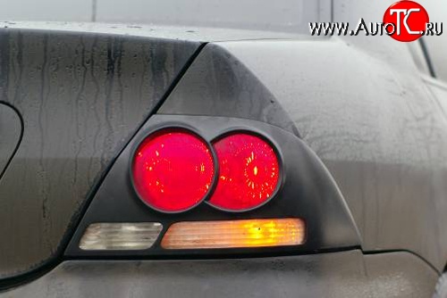 2 499 р. Накладки Evo Style на фонари Mitsubishi Lancer 9 2-ой рестайлинг седан (2005-2009) (Неокрашенные)