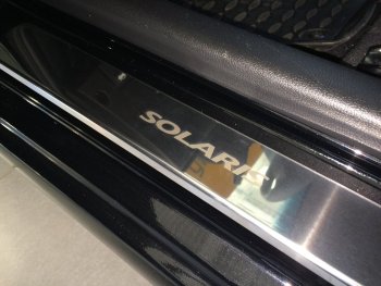 2 179 р. Накладки порожков салона INOX  Hyundai Solaris ( 1 седан,  1 хэтчбек,  1 хэтчбэк) (2010-2017) (нержавеющая сталь). Увеличить фотографию 1