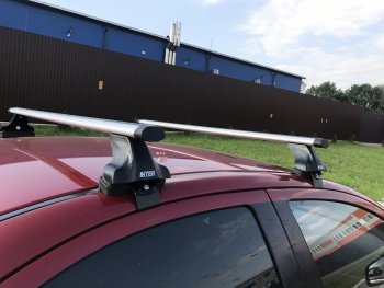 Багажник на крышу Hyundai Solaris RB дорестайлинг седан  (2010-2014) Inter. (Алюминиевые поперечины Аэро, 140 см)Цена: 6 198 р.. Увеличить фотографию 2