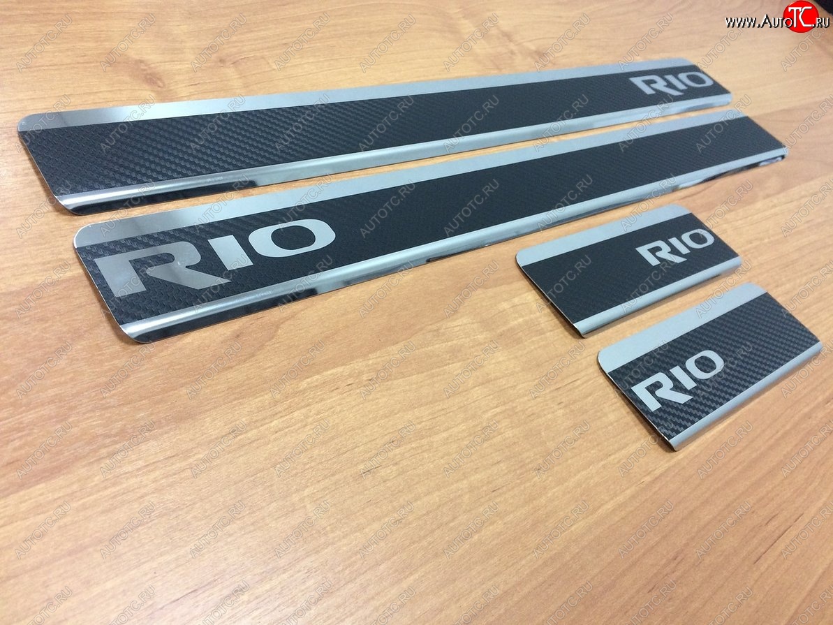 2 599 р. Пороги накладки Russtal  KIA Rio  3 QB (2011-2017) (Нержавейка с покрытием карбон и надписью)