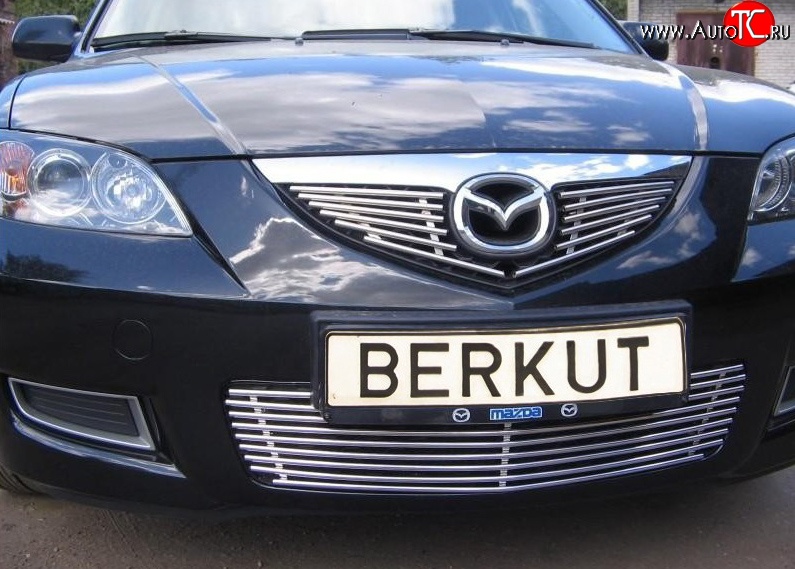 3 999 р. Декоративная вставка решетки радиатора Berkut Mazda 3/Axela BK дорестайлинг седан (2003-2006)