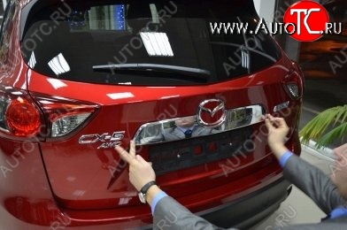 3 349 р. Накладка на крышку багажника СТ Mazda CX-5 KE дорестайлинг (2011-2014)