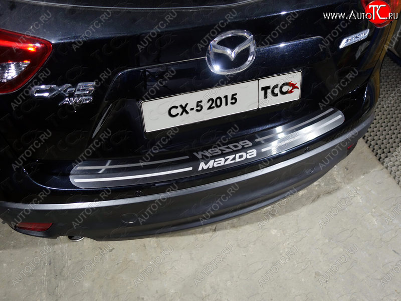 4 099 р. Накладка на задний бампер, ТСС Тюнинг  Mazda CX-5  KE (2015-2017) (лист шлифованный надпись MAZDA)