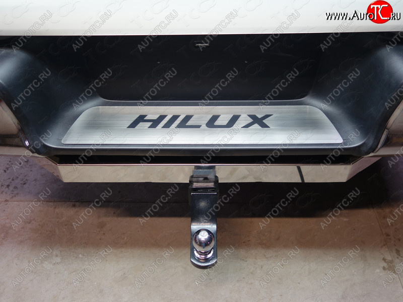 3 099 р. Накладка на задний бампер, ТСС Тюнинг  Toyota Hilux Revo (2015-2018) (лист шлифованный надпись HILUX)