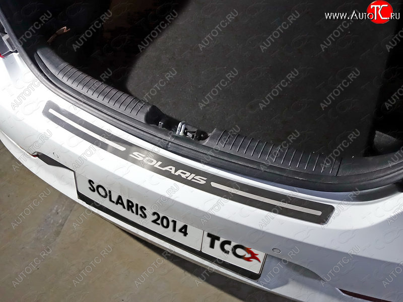 3 899 р. Накладка на задний бампер ТСС Тюнинг  Hyundai Solaris  1 хэтчбэк (2014-2017) (лист шлифованный с надписью Solaris)