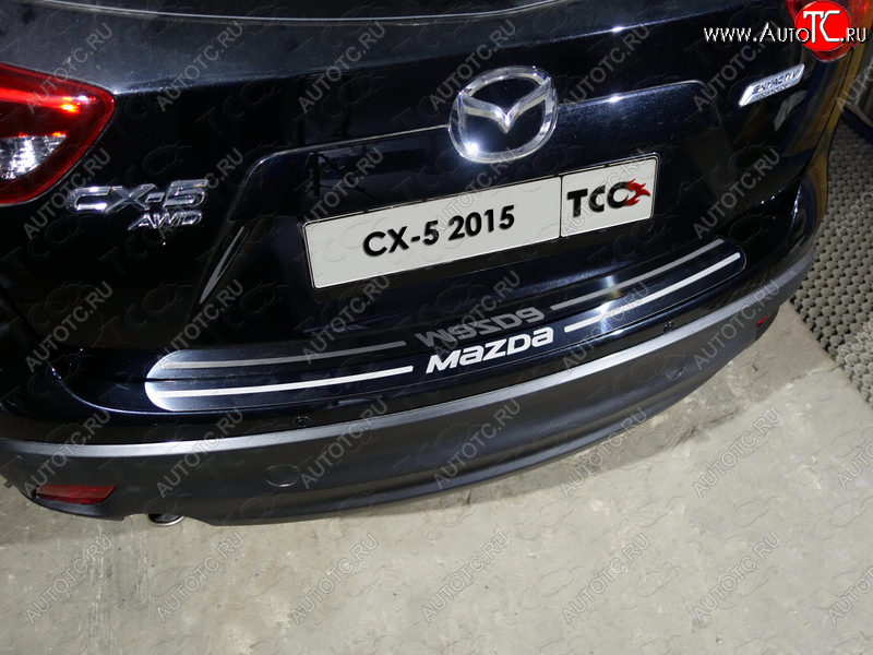 2 499 р. Накладка на задний бампер ТСС Тюнинг  Mazda CX-5  KE (2015-2017) ( лист зеркальный надпись MAZDA)