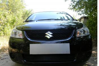 2 499 р. Защита радиатора Стрелка11 Стандарт  Suzuki SX4  GYC21S (2006-2012) дорестайлинг седан (черная). Увеличить фотографию 1