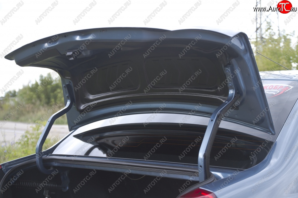 3 169 р. Обшивка внутренней части крышки багажника RA  Renault Logan  1 (2010-2016)