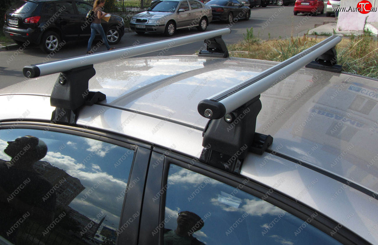 2 999 р. Багажник на крышу INTER D-1 (в обхват дверного проема) Seat Ibiza 6J хэтчбэк 5 дв. доресталийнг (2008-2012) (Cтальные поперечины длиной 1200 мм, без обтекателей)