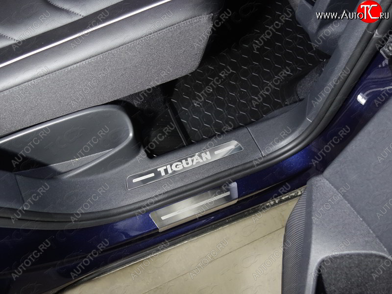1 099 р. Пороги накладки задние ТСС Volkswagen Tiguan Mk2 дорестайлинг (2016-2020) (нержавейка полированная, надпись Tiguan)
